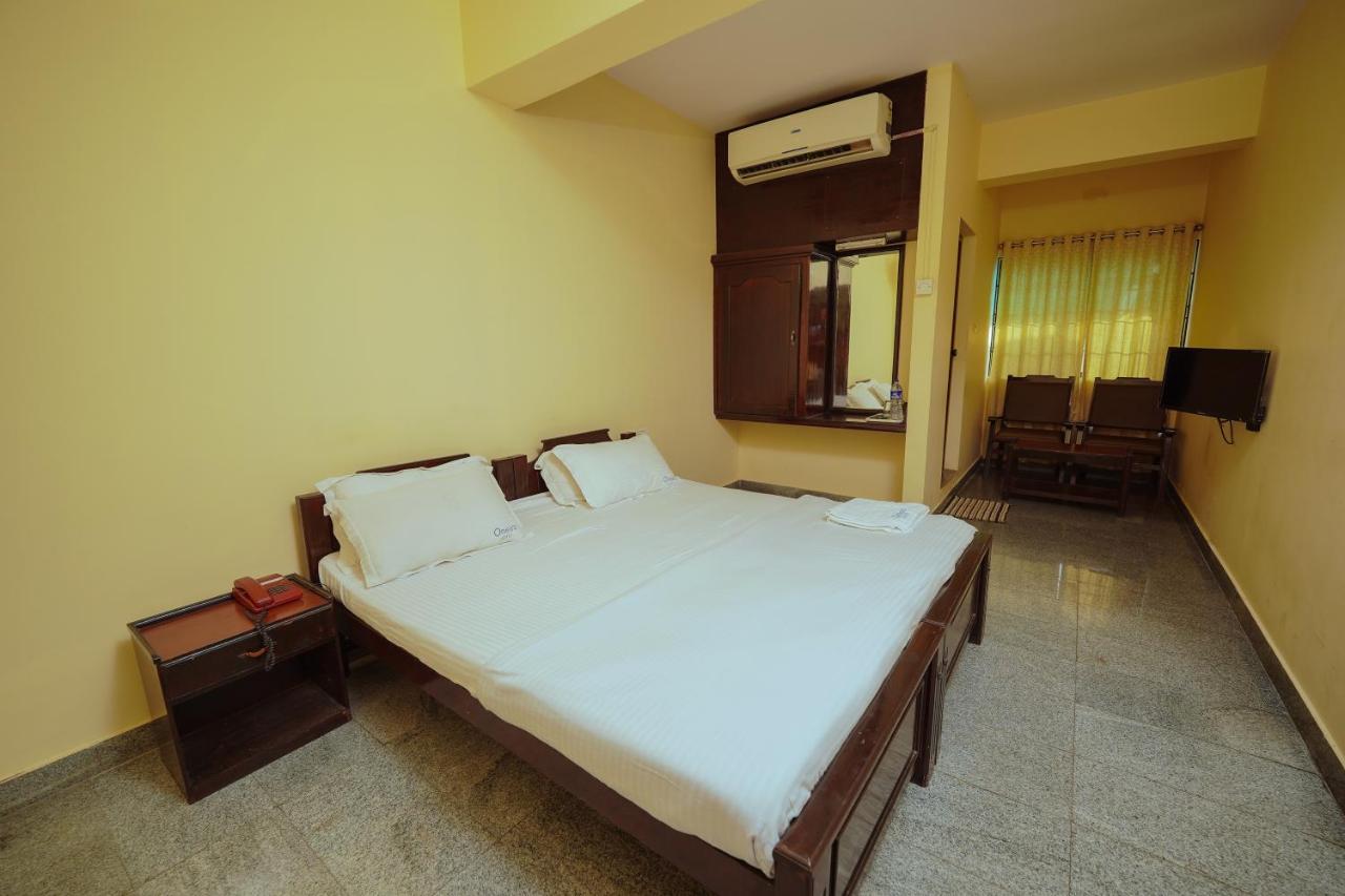 Hotel Oneiro Thrissur Extérieur photo